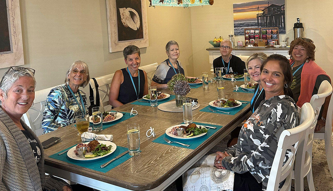 Donors smiling at dinner event